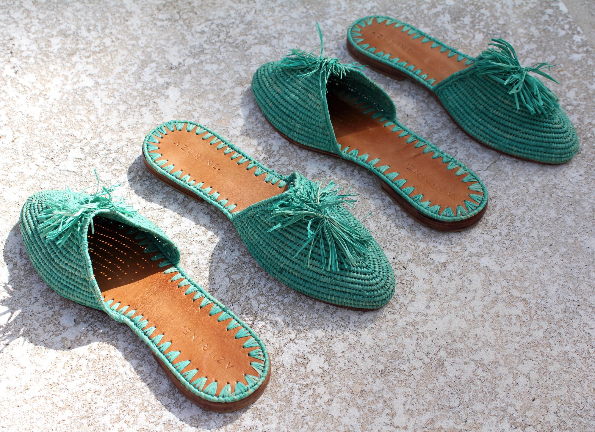 LA PISCINE TEAL POM POM RAFFIA SLIDES